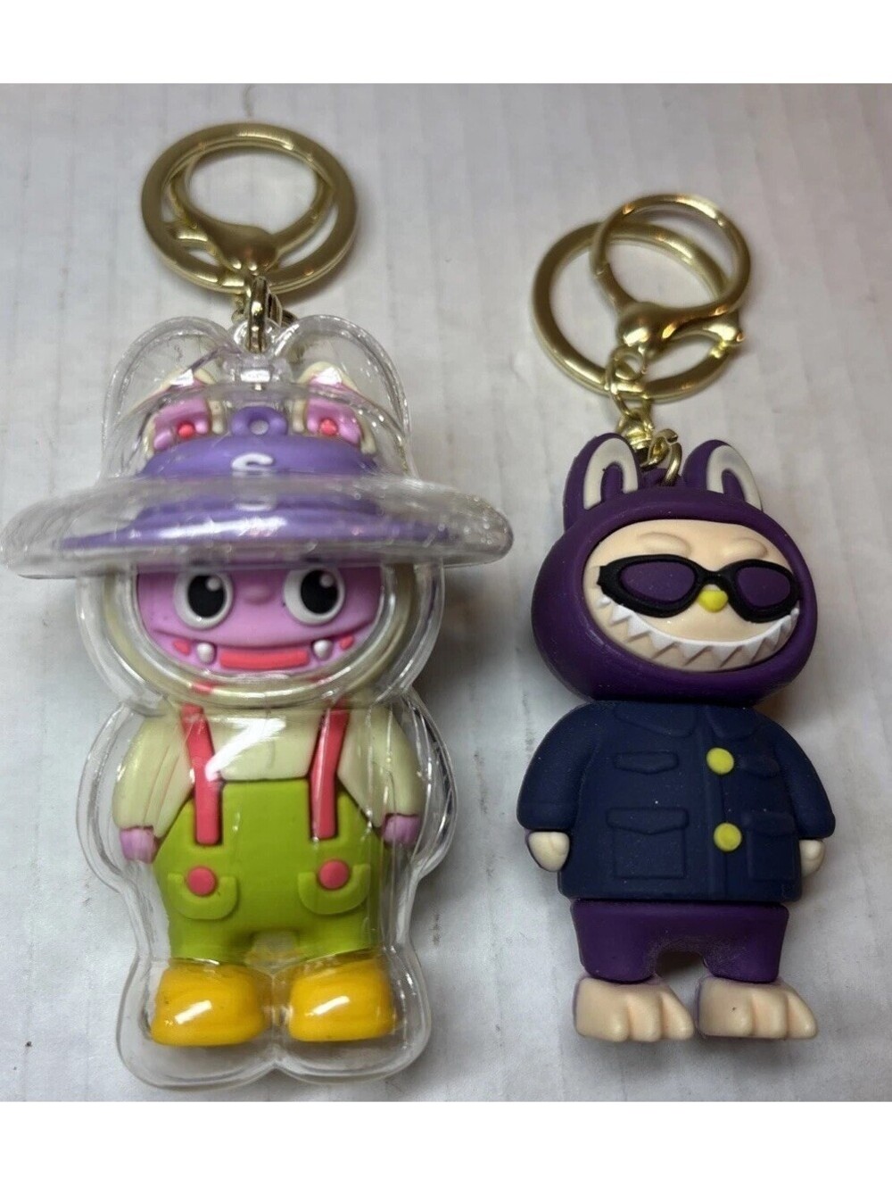Lot of 2 Funny Cartoon Bunny Character Figure Keychains Book Bag Never Used